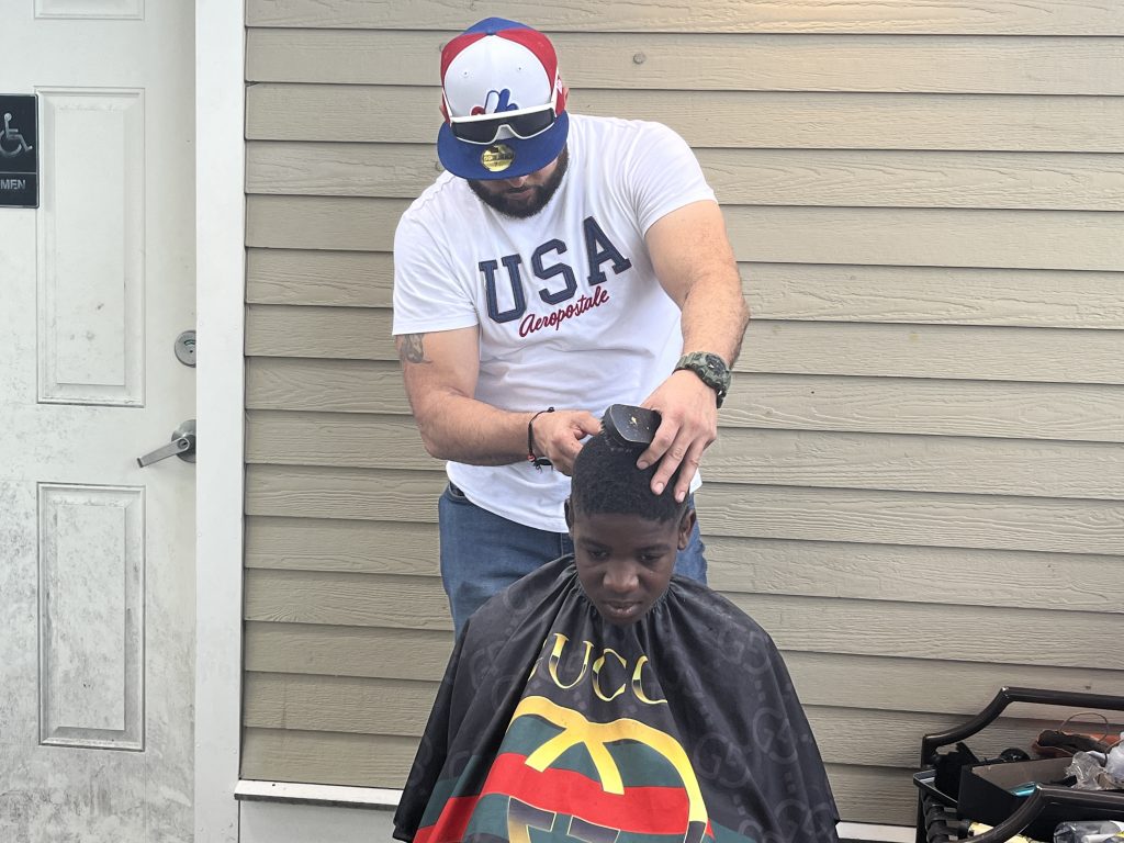 boy getting hair cut